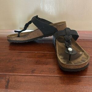 Women’s black leather Birkenstocks.